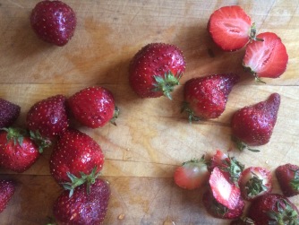 Description: strawberries on cutting board