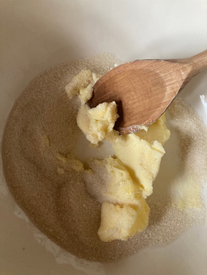 sugar and butter in bowl with spoon