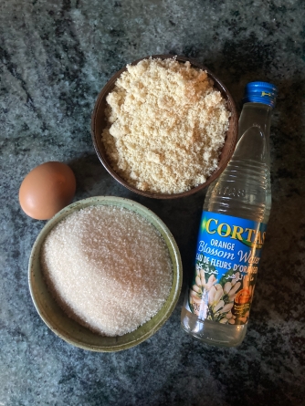 ingredients - egg, sugar, ground almonds, orange blossom water
